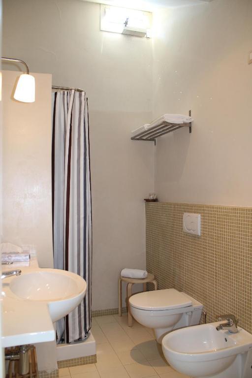 Hotel Touring Ліворно Номер фото