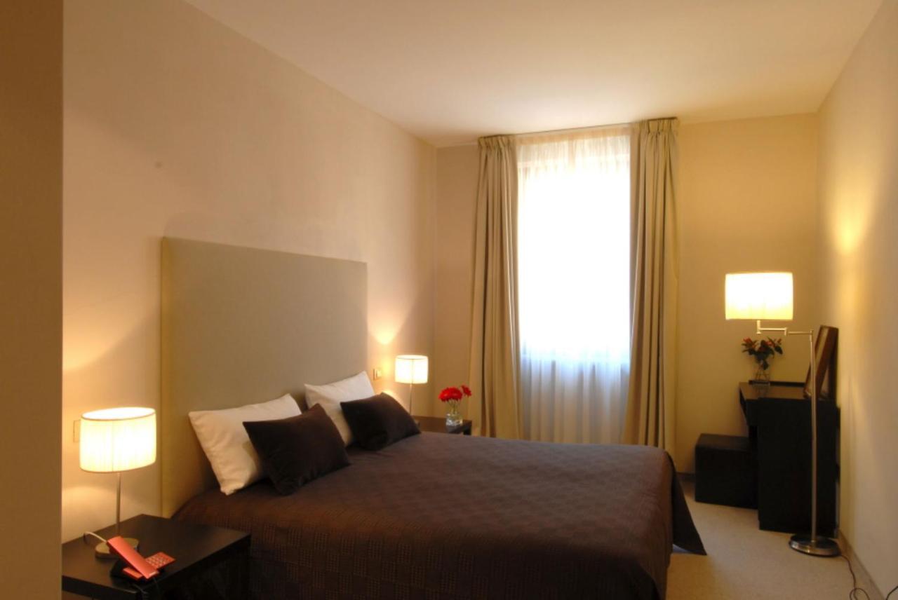 Hotel Touring Ліворно Номер фото